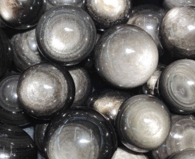Silver obsidian stone sphere