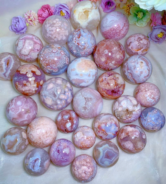 Pink amethyst flower agate sphere with druzy