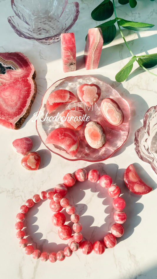 Rhodochrosite slab and palm stone